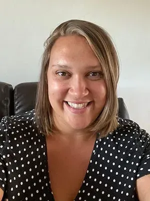 Jess Maynard — co-founder and client care manager at Green Stripe Lawn Care